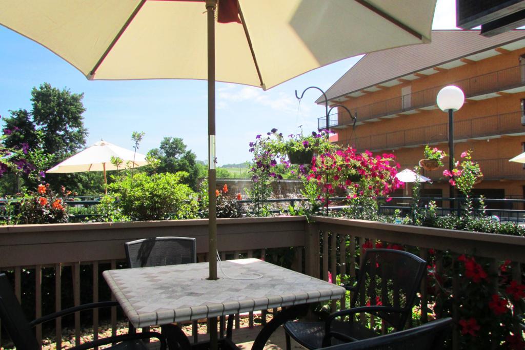 Classic Double Queen with Two Queen Beds with Shared Corridor Balcony or Patio