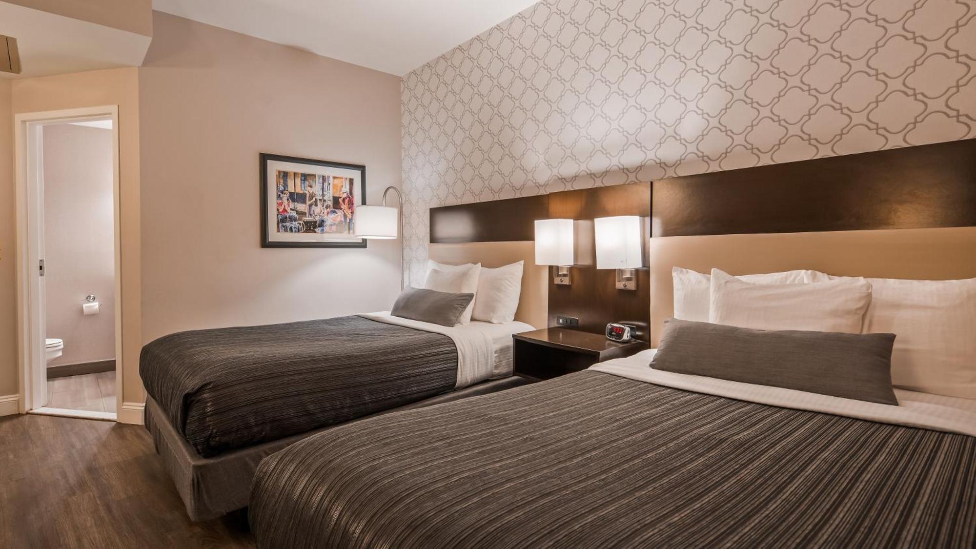 Double Room with Two Double Beds and Spa Bath - No Window/Non-Smoking
