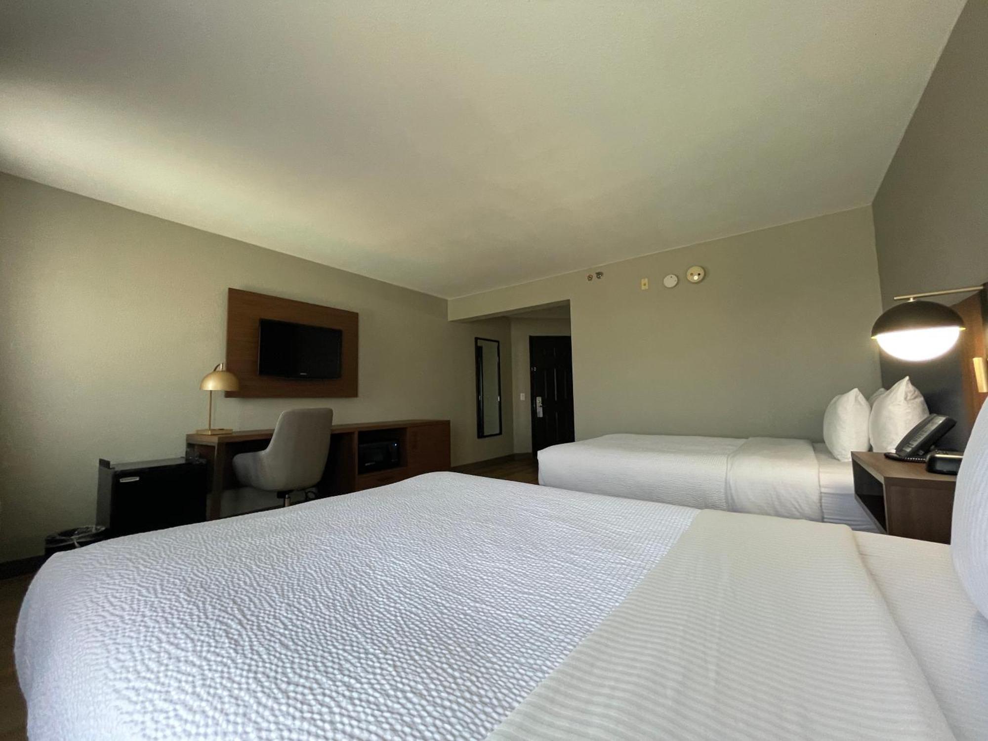 Deluxe Room with Two Double Beds and Courtyard Access -  Non-Smoking,1499757967:JPEG