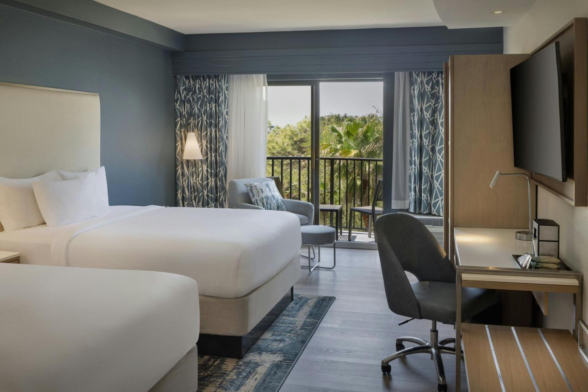 Queen Room with Two Queen Beds, Balcony and Sofa Bed
