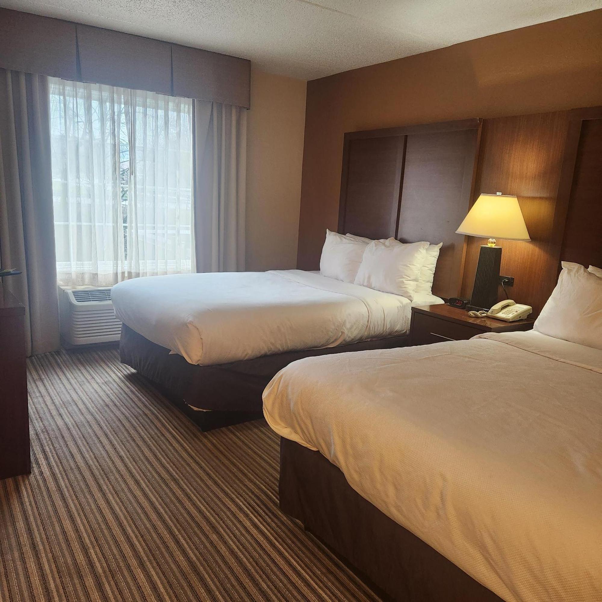 Family Room with One Queen Bed and Two Double Beds - Non-Smoking,1742713098:JPEG