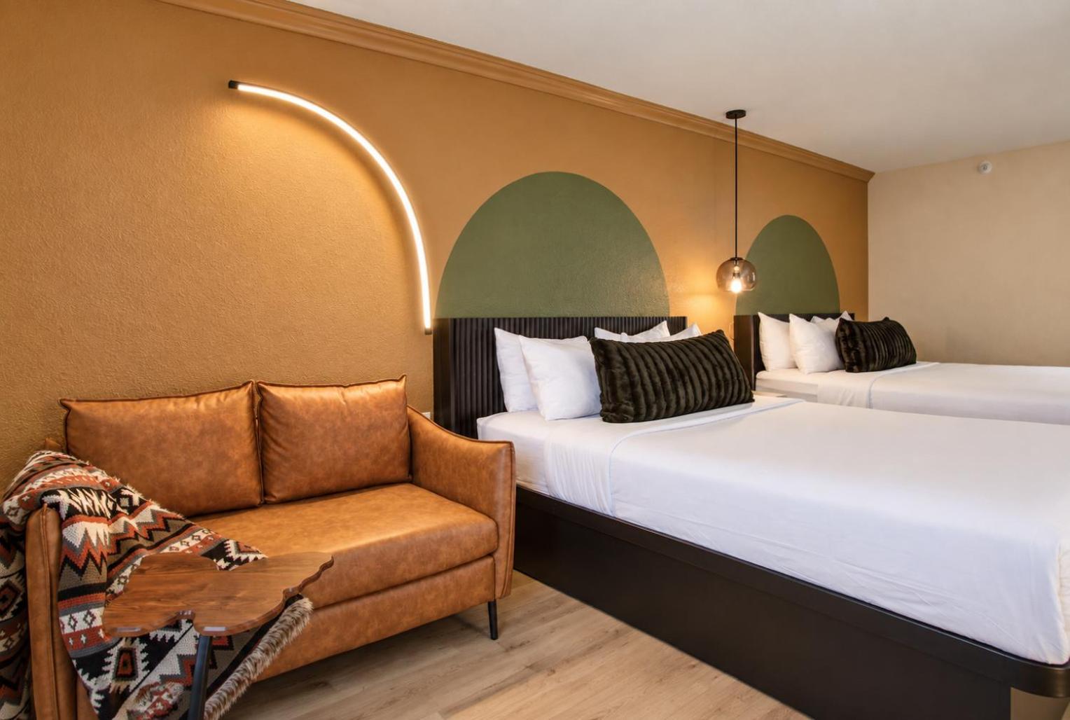 Room with Two Queen Beds and Sofa